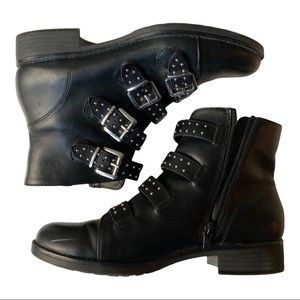 Black Steve Madden boots with fun buckles